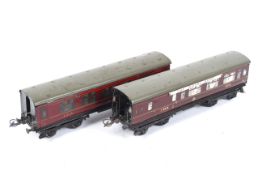 Two Hornby O gauge No 2 coaches. Both lithographed in LMS livery, comprising a 1st/3rd composite no.