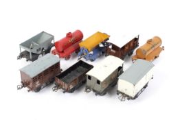 A collection of nine unboxed Hornby O gauge rolling stock wagons.
