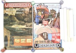 A collection of reproduction railway advertising posters.