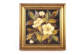 A framed Victorian relief-moulded glazed