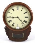 An eight-day mahogany cased pendulum wall clock. With cream enamel dial, Roman numerals.