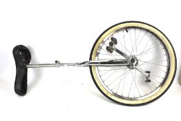 Unicycle. Steel framed with seat and pedals, H94cm.