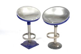 Two Transport for London (TFL) metal swivel stools provided by McNealy Brown,