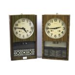 Two similar Selko 30 day wall clocks.