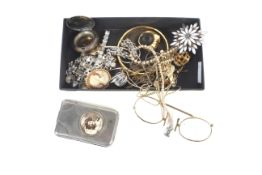 A box of mixed collectables. To include costume jewellery, card case, spectacles, etc.
