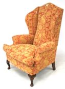 A wingback armchair.