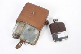 A gentlemans sporting leather cased glass hip flask and sandwich tin together with a leather clad