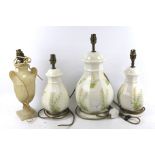 A set of three table lamps and one other.