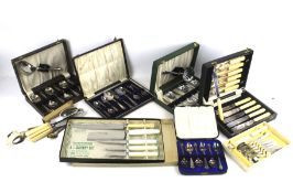 A collection of flatware. Sets in boxes including silver plate and stainless steel, etc.