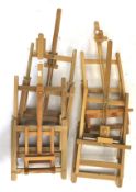 Five beech framed artists table top easels. H83cm.