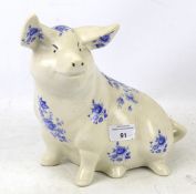 An early 20th century ironstone ceramic pig ornament.