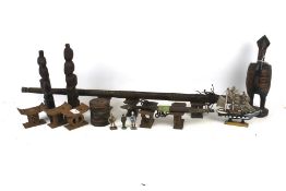 A collection of assorted West African tribal art and souvenirs.