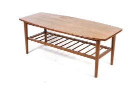 A mid-century oak topped Danish style coffee table.