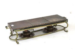 A late 19th/early 20th century copper and brass food warming stand.