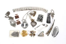 An assortment of 1970s costume jewellery. Including pendant necklaces, bracelets, brooches, etc.