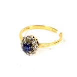 An 18ct gold sapphire and diamond dress ring.