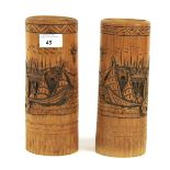 A pair of 20th century Chinese carved bamboo brushpots. H22.