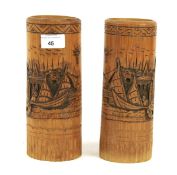 A pair of 20th century Chinese carved bamboo brushpots. H22.