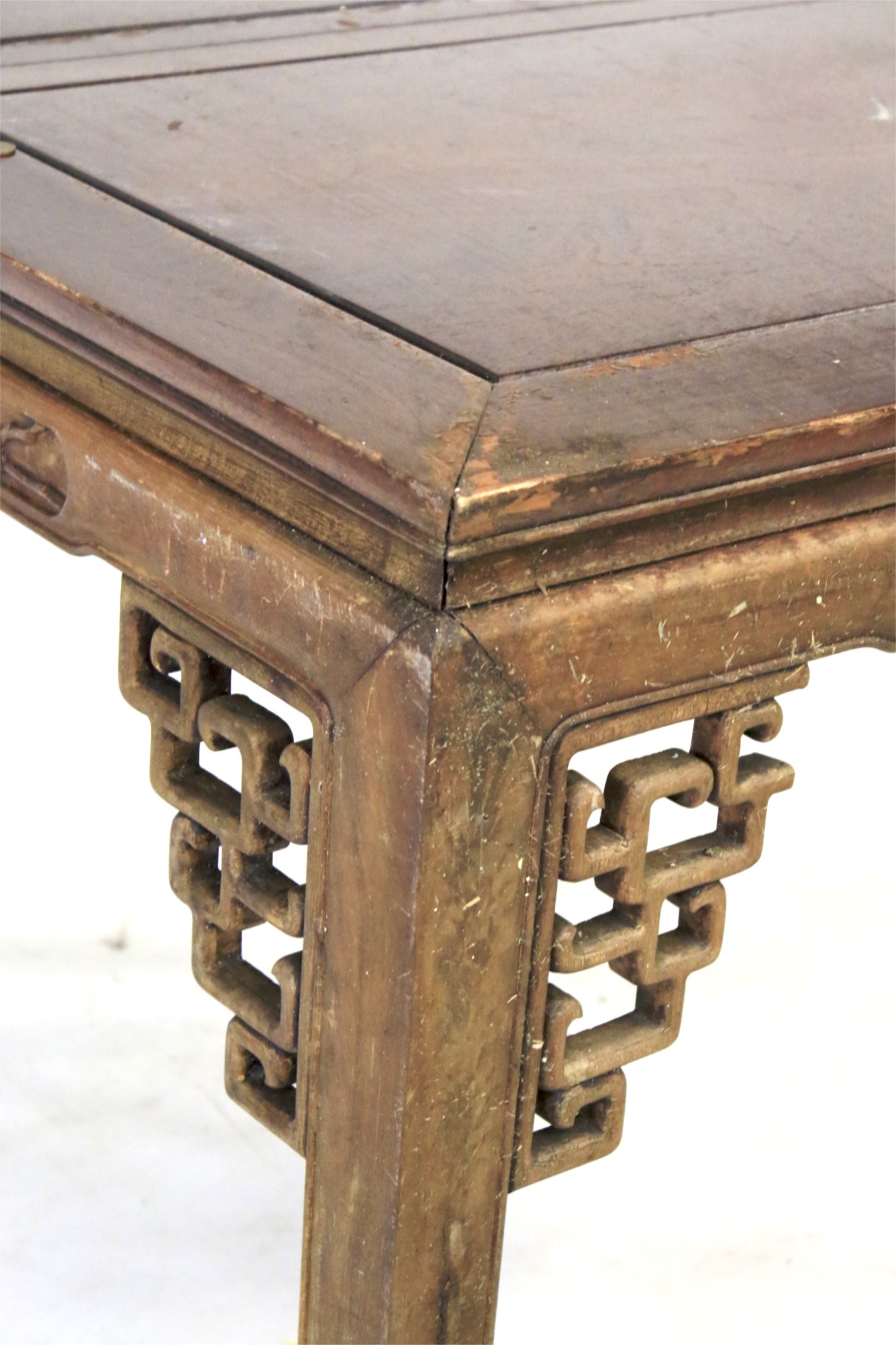 A Chinese square table. With two additional leaves and carved decoration, H78cm x W107cm x L117cm. - Image 2 of 3