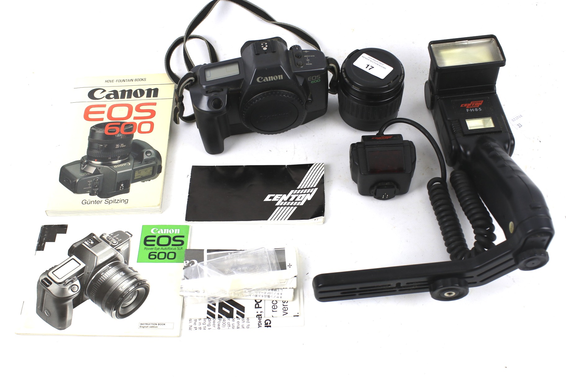 A Canon EOS 600 SLR film camera s/n 2638329. With a 35-105mm Zoom lens EF...