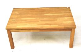 A contemporary wooden coffee table.