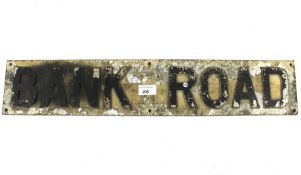 A vintage cast aluminium street name sign - BANK ROAD.