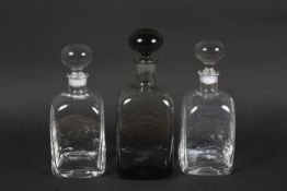 A Dartington glass square section smoke grey decanter designed by Frank Thrower,