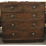 A chest of drawers. Comprising 5 drawers with metal lion head handles. H104cm x D47cm x W105cm.