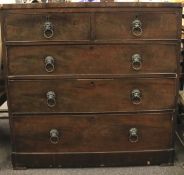 A chest of drawers. Comprising 5 drawers with metal lion head handles. H104cm x D47cm x W105cm.