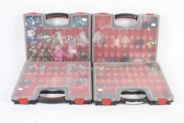A large quantity of costume jewellery making beads in four compartmentalised carry boxes.