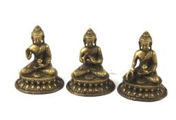 Three Tibetan-style metal seated Buddhas. Measuring H11cm.