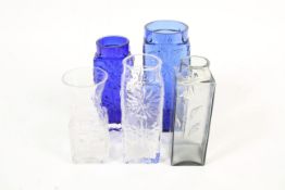 A collection of Dartington glass vases.
