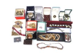 A box of assorted costume jewellery mostly boxed.