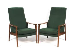 A pair of mid-century Parker Knoll teak framed armchairs.