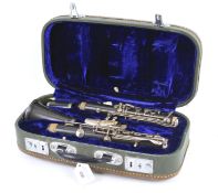 A clarinet in a box. Wooden clarinet in leather box, etc.