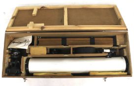 An astronomical reflector telescope boxed with accessories. D=110 F=900 with wooden tripod.