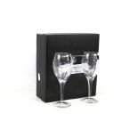 A pair of Royal Doulton lead crystal wine glasses.