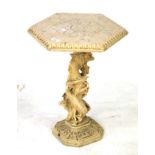 An occasional table of stone construction with dragon stand and hexagonal top. H54cm D38cm.