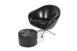 A retro black vinyl upholstered chair on chrome base,