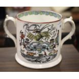 A twin handled 'Trust in God' china cider mug. Pair of frogs feature on interior, D13cm.