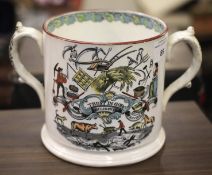 A twin handled 'Trust in God' china cider mug. Pair of frogs feature on interior, D13cm.