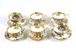 A collection of Royal Albert cups and saucers.