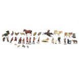 A collection of assorted vintage die-cast lead figures.