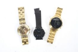 Three contemporary gentleman's watches.