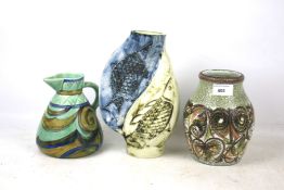 Three stoneware items noting 2 jugs and vase