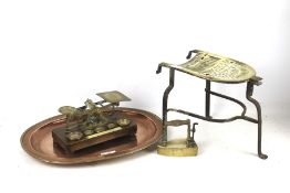 A small group of metalware. To include postage scales, small iron, copper tray and a trivet.