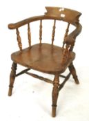 Early 20th century smokers bow-armchair. With turned supports and legs, H74cm x D47cm x W53cm.