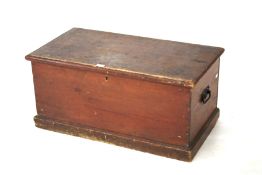 A vintage stained pine trunk tool box.