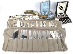 A collection of silver plated flatware.