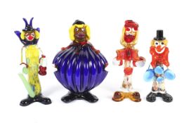 Four assorted 20th century Murano glass clowns.